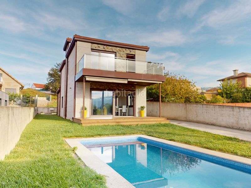 Foto da7c63f1-3146-498e-b326-1f2b327ccee0. Casa amb calefacció aparcament piscina a Valadares - Beade Vigo