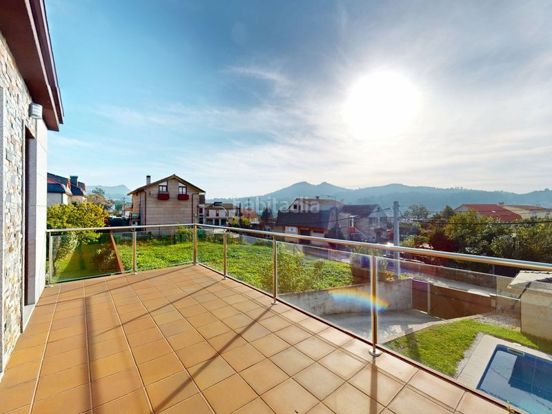 Foto defa3c91-2c5f-43b4-9772-ccea51f15f2b. Casa amb calefacció aparcament piscina a Valadares - Beade Vigo