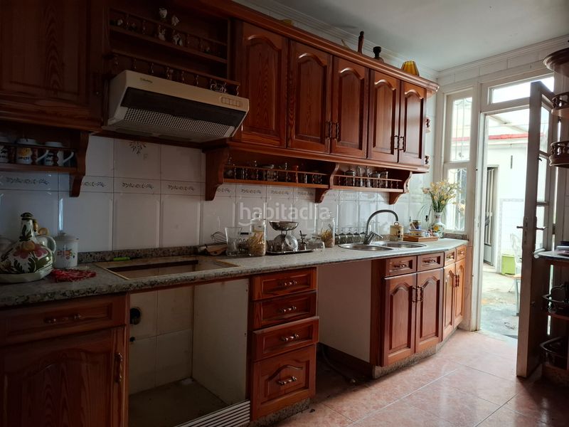Foto fcfa80df-8bf0-4718-9255-c08385c91733. Casa adossada a Lavadores Vigo