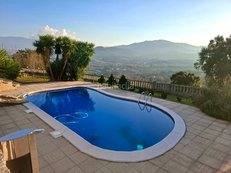 Foto 1575b1c6-7b86-47cb-993f-63ef64684145. Casa amb calefacció aparcament piscina a Neves (As)