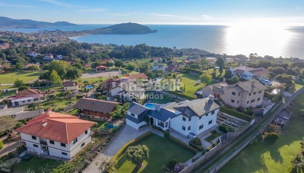 Foto da9f0c2b-51db-440b-9991-5949a155c901. Casa amb calefacció aparcament piscina a Coruxo - Oia - Saiáns Vigo