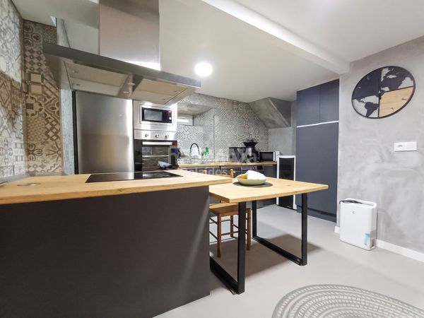 Foto e8fcf771-6931-498a-a103-7d4fe67b32dd. Casa adossada amb calefacció a Guarda (A)