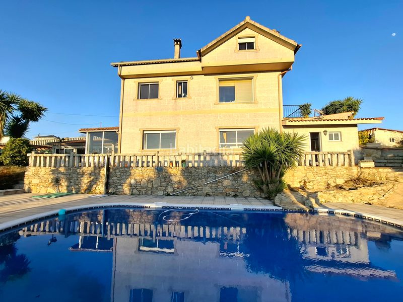 Foto 0f61b0ca-f602-4d2d-bbf3-e2c0ef3d3ee2. Casa amb calefacció aparcament piscina a Neves (As)