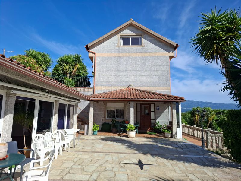 Foto f821eb43-920f-4679-bd1e-f2591a2c6880. Casa amb calefacció aparcament piscina a Neves (As)