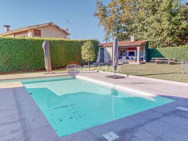 Foto e230cc57-362b-4053-aa66-98352bfe4ac2. Casa amb calefacció aparcament piscina a Tui