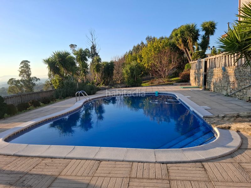 Foto 8a0823fc-4799-4b16-b654-1127c14c7775. Casa amb calefacció aparcament piscina a Neves (As)