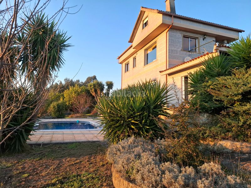 Foto c407d8b4-125b-4e7f-9528-b9a7148ca839. Casa amb calefacció aparcament piscina a Neves (As)