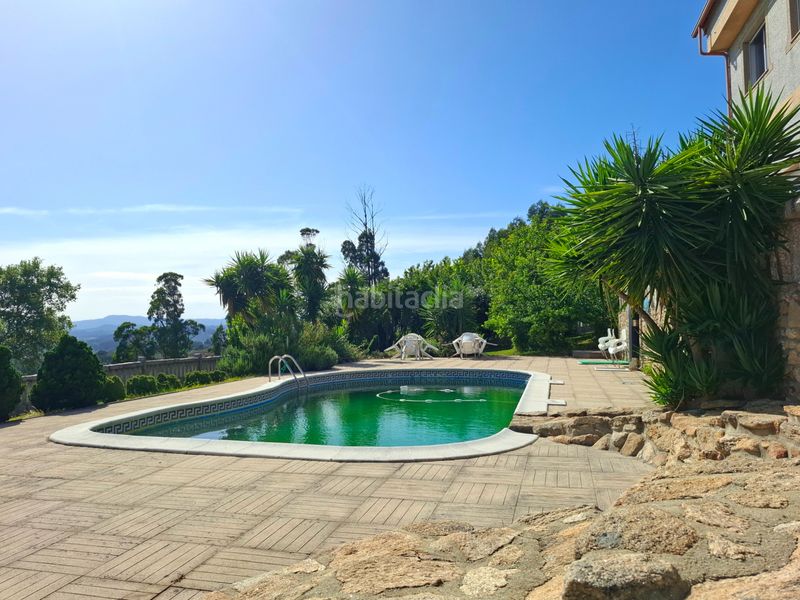 Foto d16c1410-07ad-48c4-b961-c969aa48848d. Casa amb calefacció aparcament piscina a Neves (As)