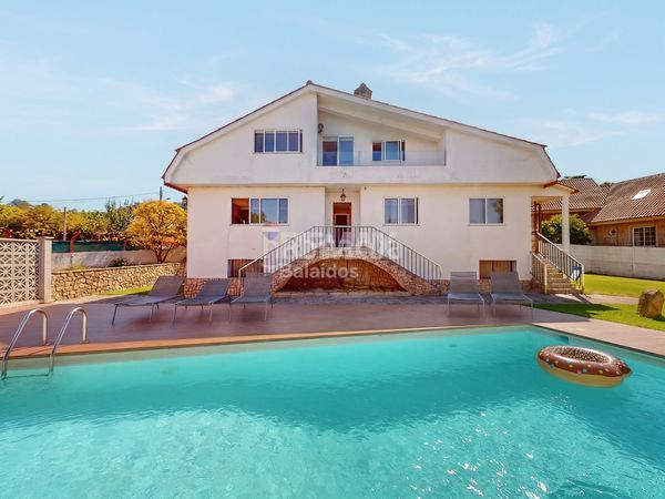 Foto b768b625-6a54-4f11-96c6-746836204cd1. Casa amb calefacció aparcament piscina a Sardoma - Castrelos Vigo