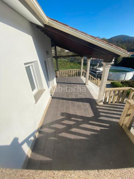 Foto c86e8fdf-a0ba-46f4-8ed8-8a6f105f56e7. Casa amb xemeneia calefacció aparcament a Noia