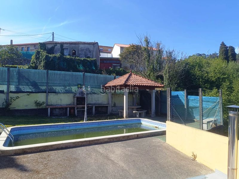 Foto ba965f61-d040-48fc-805d-205328f6c510. Casa amb calefacció aparcament piscina a Outes