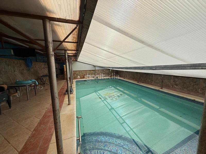 Foto d6a504ee-a11a-479d-be43-184c51df477c. Chalet exclusivo chalet independiente en vía augusta con piscina y amplio jardín en Écija
