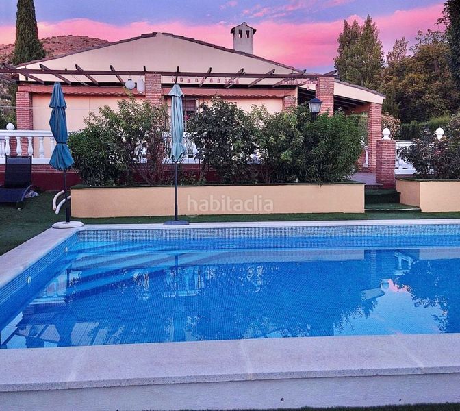 Foto 6402e6d2-f0b4-42f7-ad60-48ec23bc0636. Xalet amb xemeneia calefacció aparcament piscina a Jaén