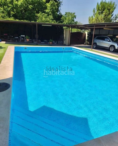 Foto cc217cfa-e4d8-4eee-98d6-225684729c0a. Xalet amb xemeneia calefacció aparcament piscina a Jaén