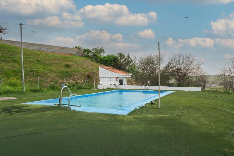 Foto db420eaa-4b86-4ce3-97a8-519613801d19. Casa adosada casa con piscina comunitaria en Otura
