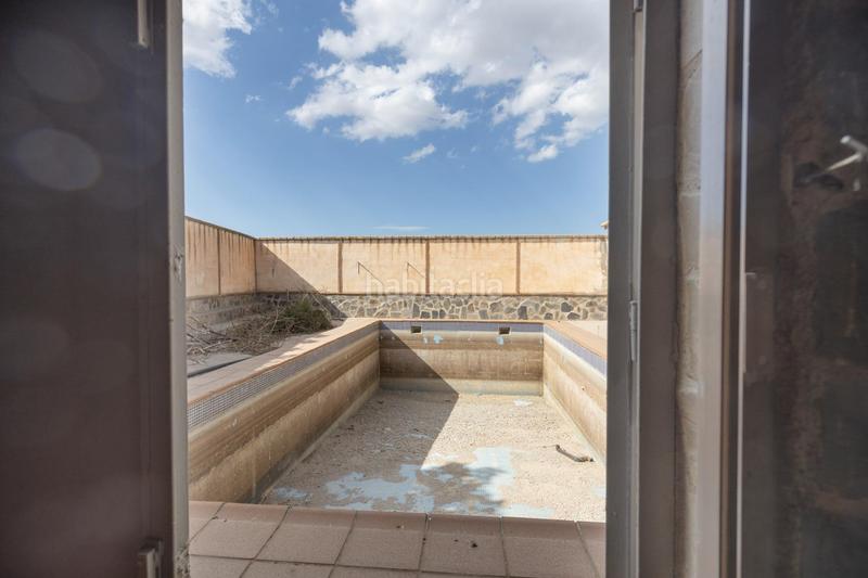 Foto f43aa4e6-6ab2-49a5-ac3d-f0ba3add1124. Masia amb aparcament piscina a Polideportivo Alhendín