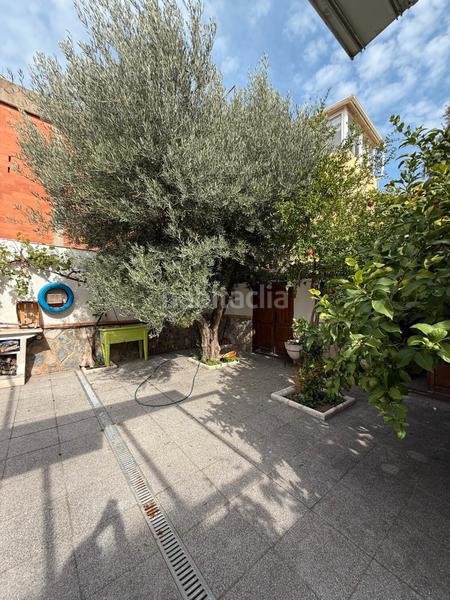 Foto df80e41a-77f1-4dec-94e8-122677550ae3. Casa espectacular casa de 4 plantas con garaje, buhardilla y terrazas en Santa Coloma de Gramenet