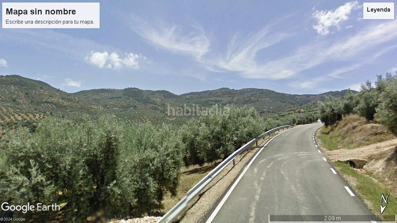 Foto d1afe8f1-a12a-4d4d-91bf-5975b26e6a3f. Finca rústica parcela de olivar en producción en Martos