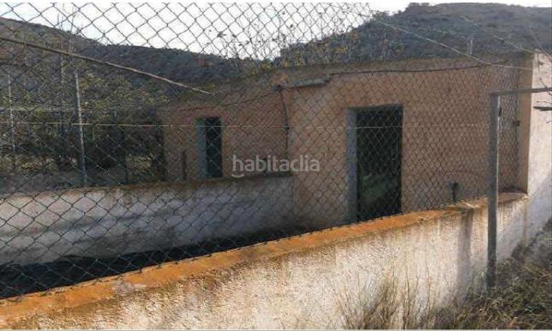 Foto 0f65cd0f-31c8-413c-9cf2-c61c21a1d116. Finca rústica finca de regadío con casa-cueva. en Santa Cruz de Marchena