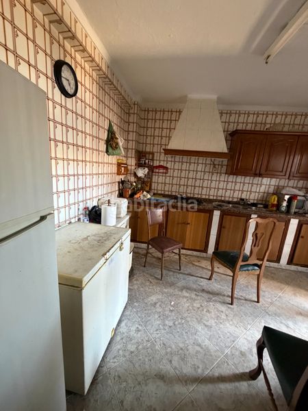 Foto f5ec5602-08f1-4877-bb49-841cc08345e0. Casa amb aparcament a Cantillana