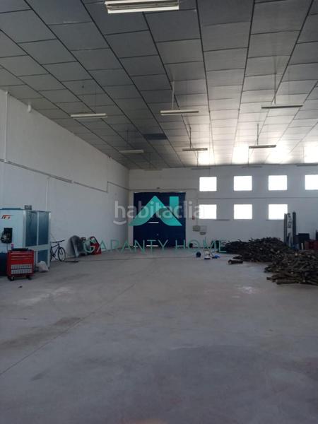 Foto f8ab39b5-1bb0-4b3b-92b6-0fd9ab029d4a. Bâtiment à usage industriel dans Navas del Selpillar Lucena