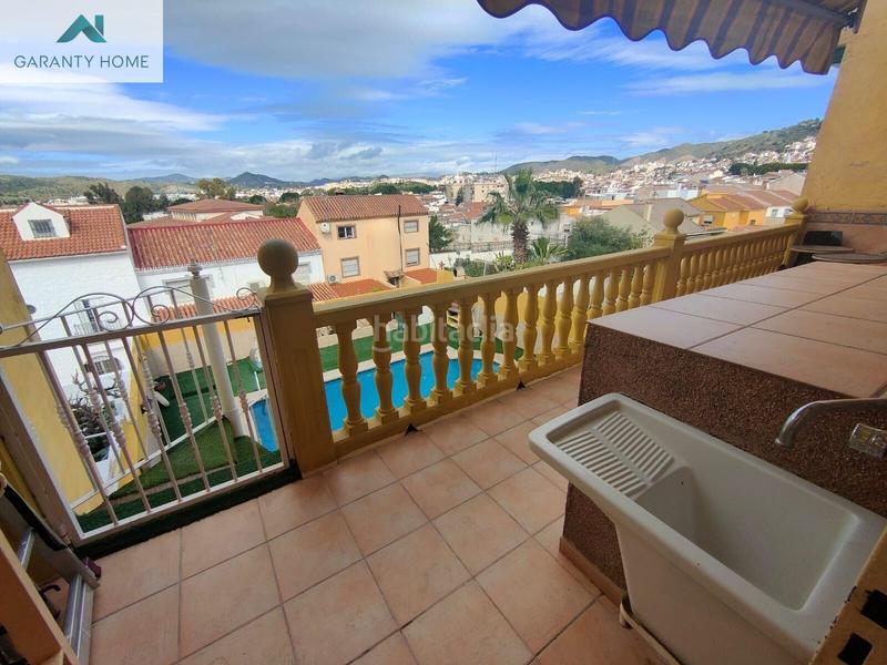 Foto 308b9ce0-59ea-4142-acbc-1cd20f9d1333. Casa aparellada amb calefacció aparcament piscina a Málaga
