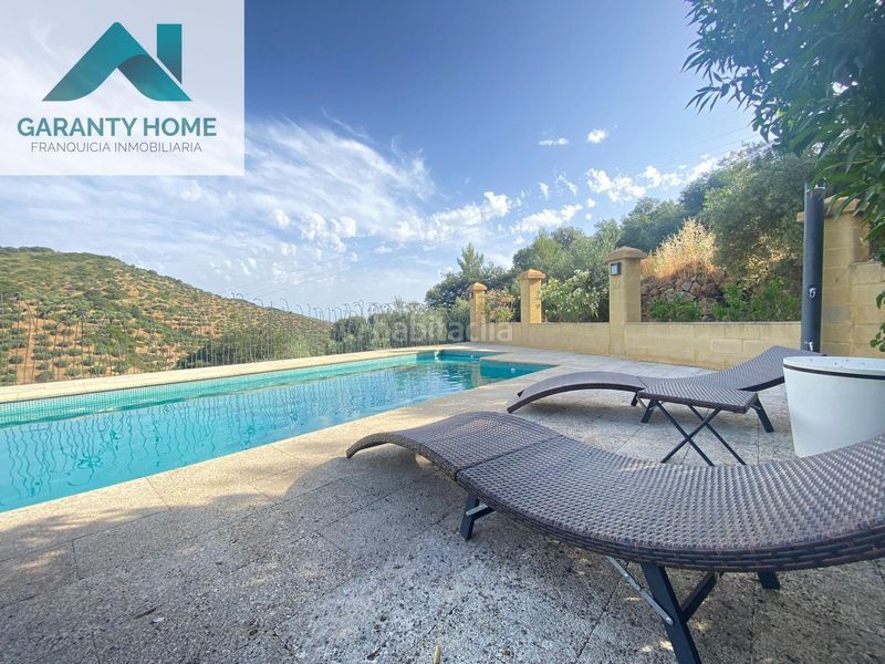 Foto 2c9bf13a-cab7-451f-b792-881b48b1ef07. Masia amb aparcament piscina a Martos