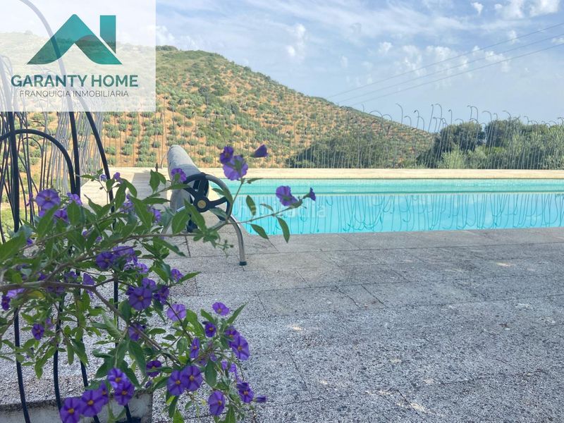 Foto cb0f7730-b37f-4e09-8d00-bb68f3b7c634. Masia amb aparcament piscina a Martos