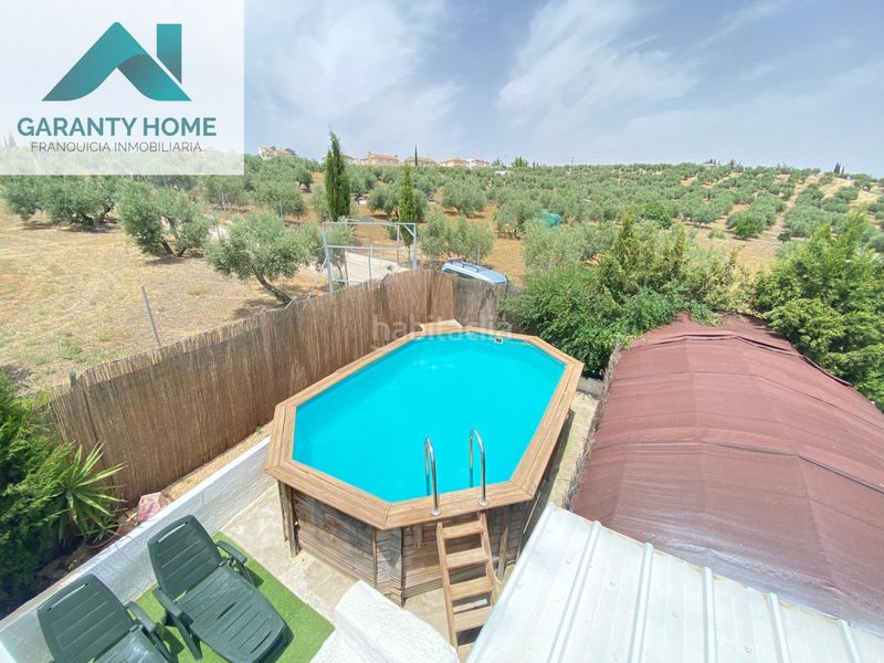 Foto 9ee99c87-57af-493c-8301-27ed8088fe74. Chalet finca con piscina y placas solares en Torredonjimeno