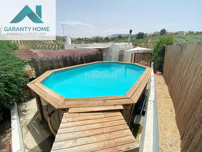 Foto d30654ab-e221-42bc-b65c-5a455c2f8584. Chalet finca con piscina y placas solares en Torredonjimeno