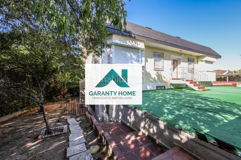 Foto 1821feed-2554-451f-85ab-c6786d0ff2cc. Chalet con riscaldamento in Urb. Calypo Navalcarnero