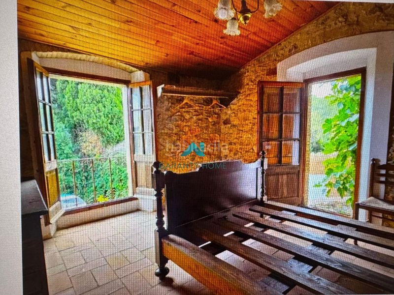 Foto 22d14f2f-bb2e-4059-a156-e78be8393560. Casa amb aparcament a Llofriu