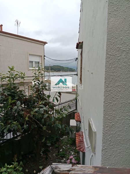 Foto ec820d8b-c0b9-471d-8933-4eca240d4176. Casa amb aparcament a Illa de Arousa (A)