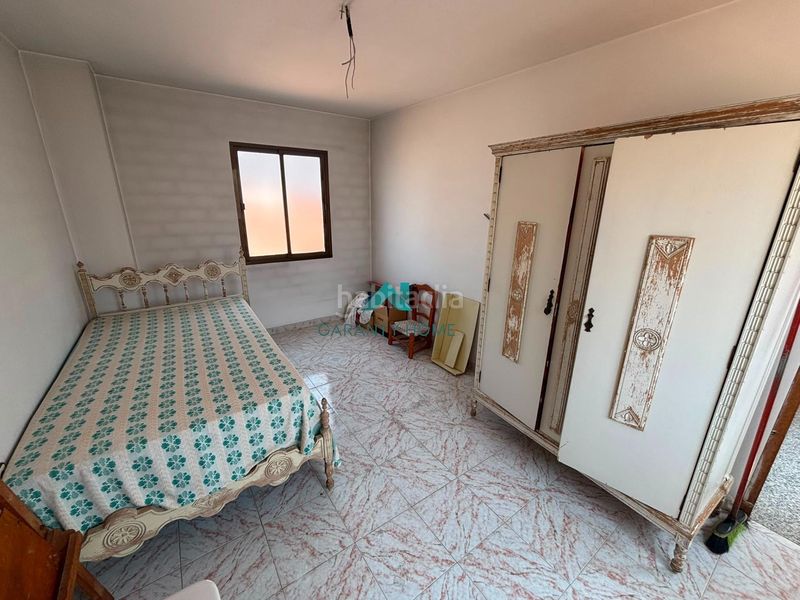 Foto c8525856-12e4-48e2-b5b6-36b3ac588e18. Edificio  junto al parque con tres viviendas en Torredonjimeno