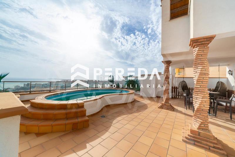 Foto e5e954bd-2cbb-49ae-b582-18cfe3d5bbb1. Chalet con parcheggio piscina in El Puerto Roquetas de Mar