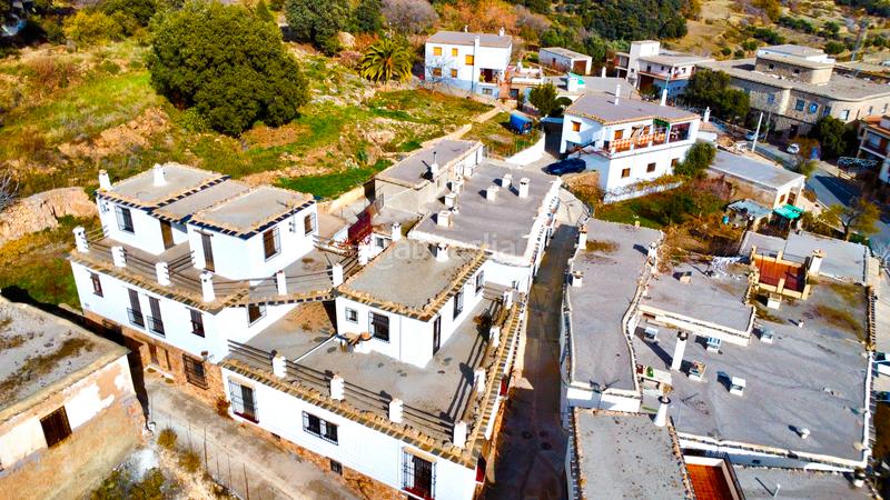 Foto 9e845860-1547-4d4c-a65e-ea06b5665d00. Edificio  de 3 viviendas rurales en Juviles