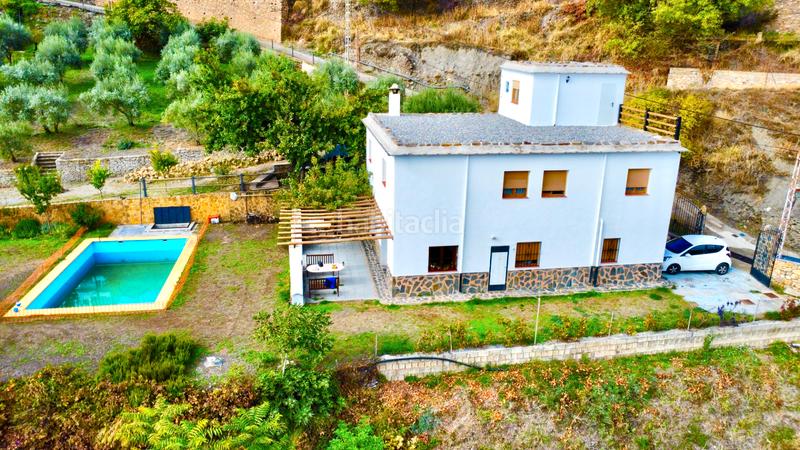 Foto 111e6ff4-bd80-40c2-b0ae-81b4ff09131a. Xalet amb xemeneia calefacció aparcament piscina a Bérchules