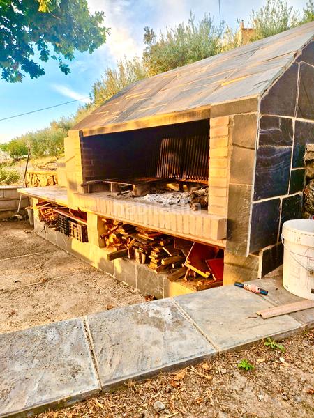 Foto 2185369a-eaf0-44e5-bc53-9d0fdb1a2516. Xalet amb xemeneia calefacció aparcament piscina a Bérchules