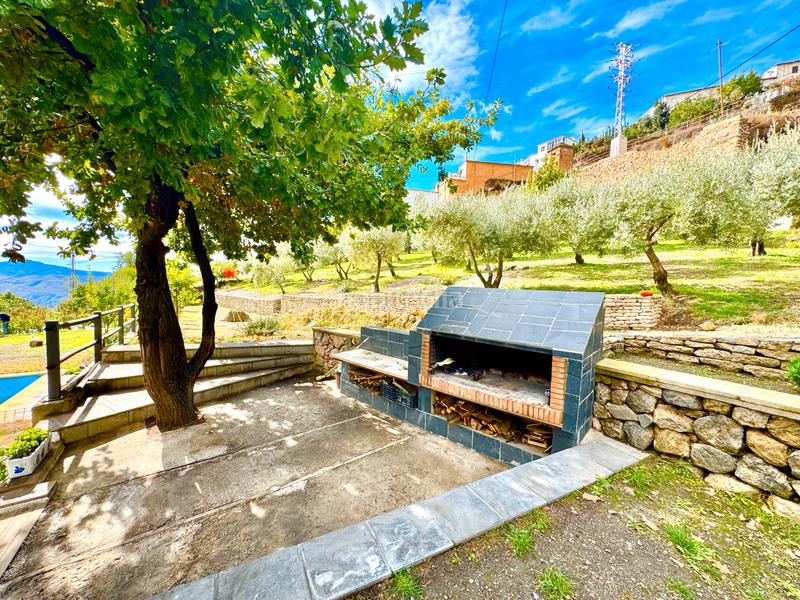 Foto 27716b5d-895e-4474-9b21-b9925e137fd7. Xalet amb xemeneia calefacció aparcament piscina a Bérchules