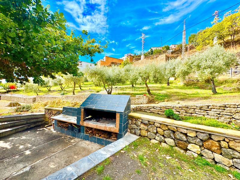 Foto 360fc624-9a91-41ad-a523-8fb92e46d73f. Xalet amb xemeneia calefacció aparcament piscina a Bérchules