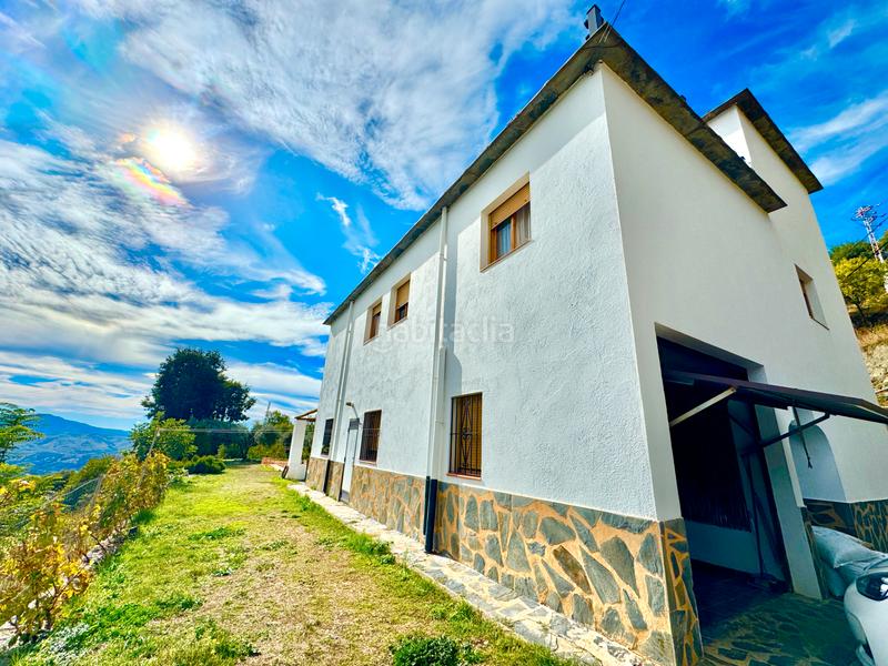 Foto c5b586ad-9fb8-47be-a2bb-0302cf847ace. Xalet amb xemeneia calefacció aparcament piscina a Bérchules