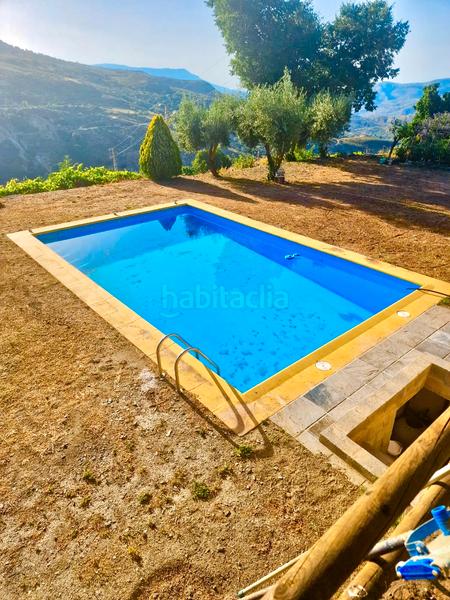 Foto c7f8c6cd-aa18-488e-831f-3bc23c5b25c7. Xalet amb xemeneia calefacció aparcament piscina a Bérchules