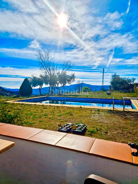 Foto c8ca5cd5-09ca-4a75-bb29-40188535a4f7. Xalet amb xemeneia calefacció aparcament piscina a Bérchules