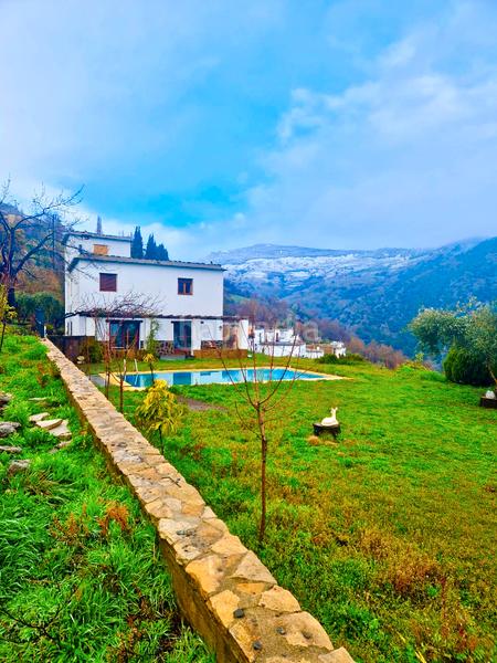 Foto d3df4d7d-ba51-4043-808c-c5474e53db38. Xalet amb xemeneia calefacció aparcament piscina a Bérchules