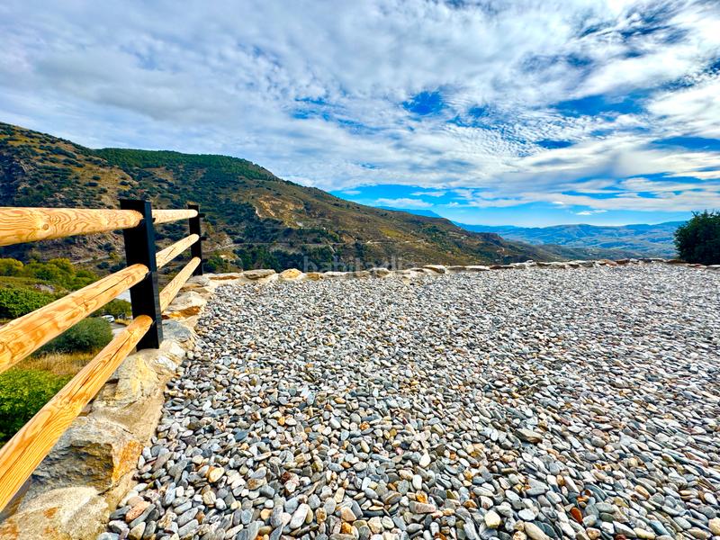 Foto df45af41-ffab-4d30-9e2e-23dc2dd9a167. Xalet amb xemeneia calefacció aparcament piscina a Bérchules