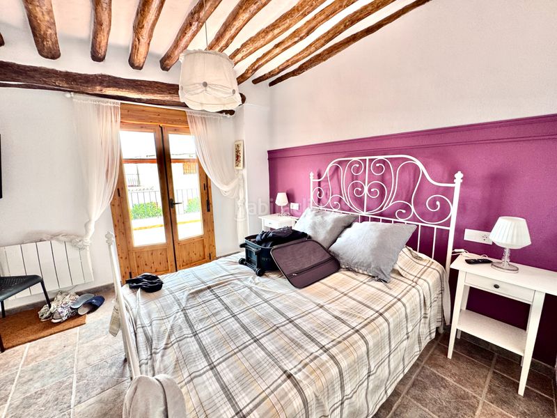 Foto bd0e9275-d305-47a8-8bbc-e9406c8d2b33. Casa con camino riscaldamento in Válor