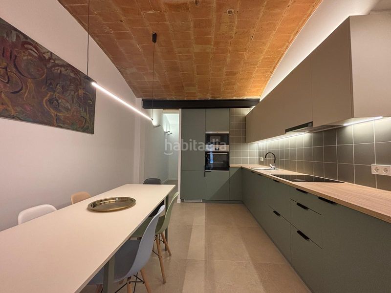 Foto 5f142fb1-3dfb-42e1-aed1-055cb057fba0. Casa aparellada amb calefacció a Eixample Nord Girona