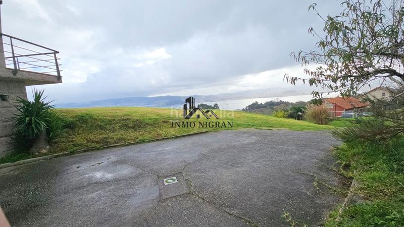 Foto 418ee897-d582-44fb-a2cc-5dc194474ad0. Haus mit heizung parking in Moaña