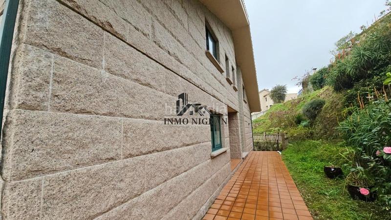 Foto 54f0d0ee-c756-4d49-ac13-7df58330a7c7. Haus mit heizung parking in Moaña