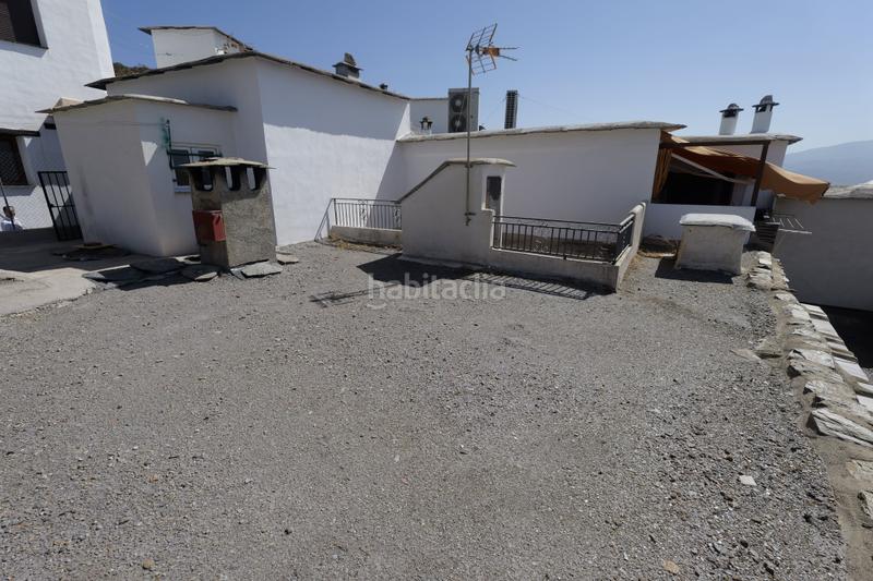 Foto 0705a1c3-0604-4ae7-abb9-79434392c3a2. Casa adosada en calle sierpe 1 en Nevada